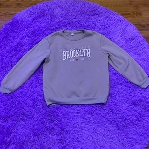 Light brown sweatshirt